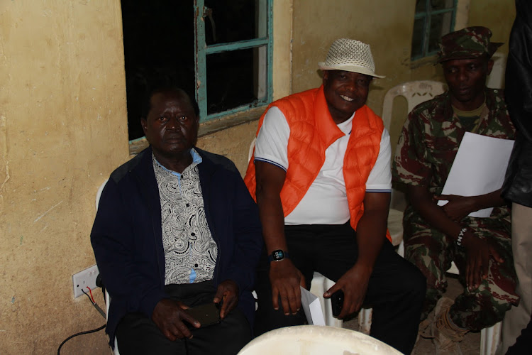 MPs Adipo Okuome (Karachuonyo) and Martin Owino (Ndhiwa ) at the tallying centre in Homa Bay Boys High School on April 15,2022