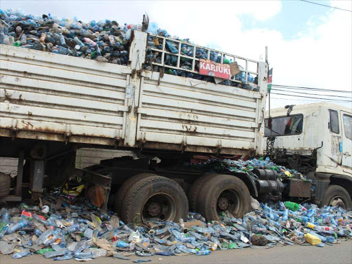 plastic bottles that have been disposed in a trailer