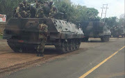 Armoured military vehicles seen heading towards the Zimbabwean capital of Harare; situation unclear on 14 November 2017/