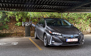 The European Union plans to toughen its method for measuring carbon dioxide emissions from plug-in hybrid cars such as the Prius, pictured. 