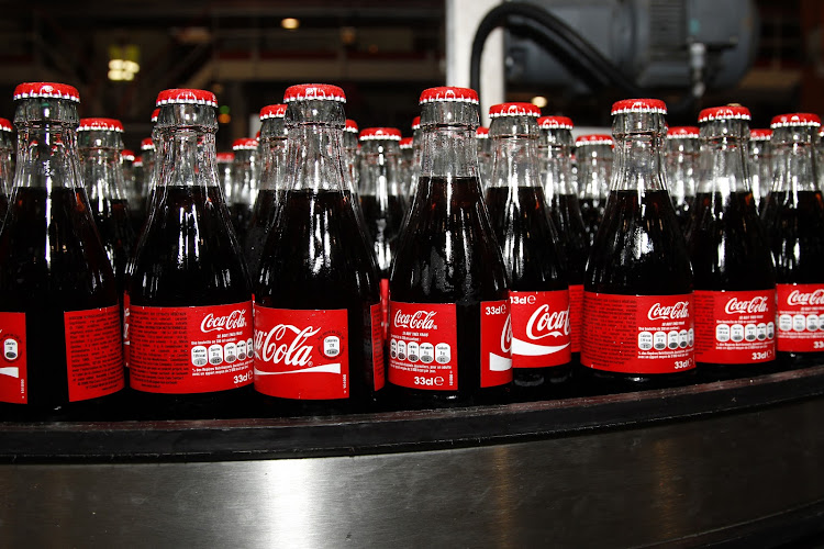 The bottler, which counted Russia as one of its biggest markets, said it was still in the process of implementing the decision by Coca-Cola.