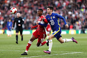 Isaiah Jones of Middlesbrough battles for possession with Christian Pulisic of Chelsea in the FA Cup quarterfinal at Riverside Stadium in Middlesbrough on March 19 2022.