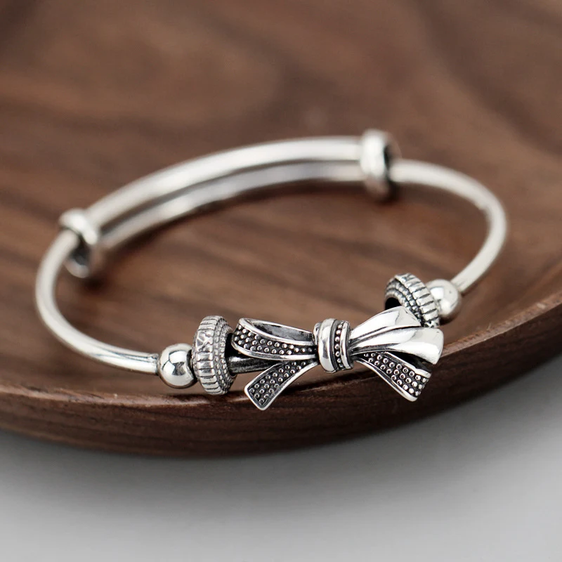 Title 3, 999 Sterling zilveren strikarmband voor dames. ...