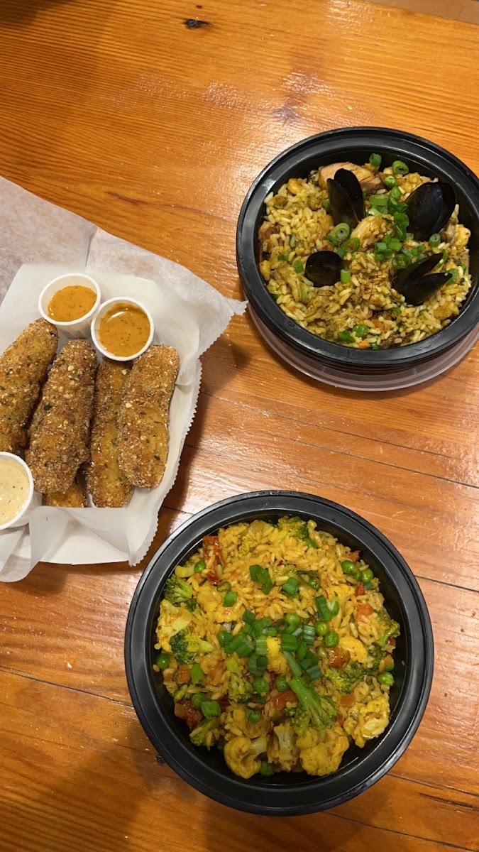 Cod croquettes, paella Valencia (top) and vegetarian paella (bottom)