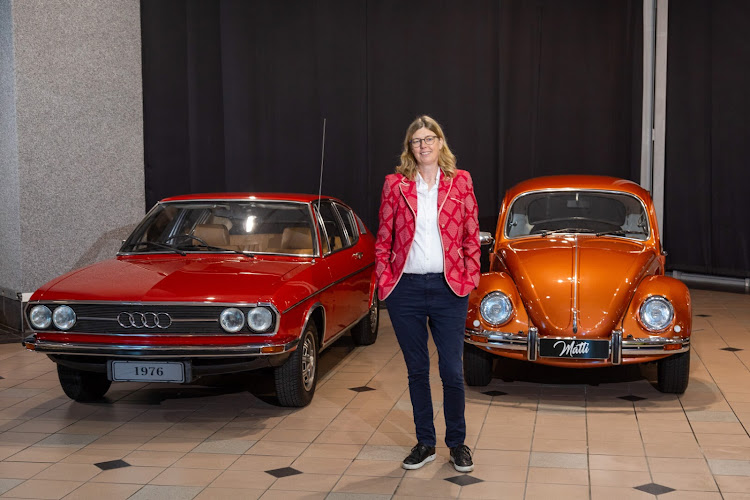 Volkswagen SA MD Martina Biene with some of the pristine models found at the Auto Pavillion. Picture: SUPPLIED