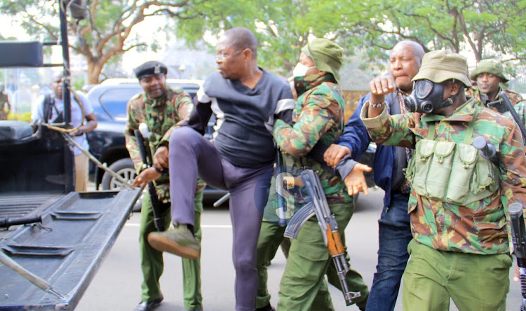 Senate leader of minority Stewart Madzayo arrested by police while trying to access KICC building during the Azimio protests in Nairobi on March.20 , 2023.