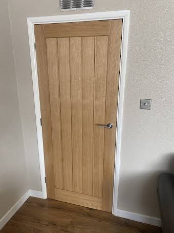 Oak door hanging album cover