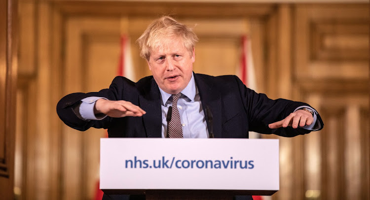 UK Prime Minister Boris Johnson at a coronavirus news conference in March. Picture: THE TIMES/BLOOMBERG/RICHARD POHLE