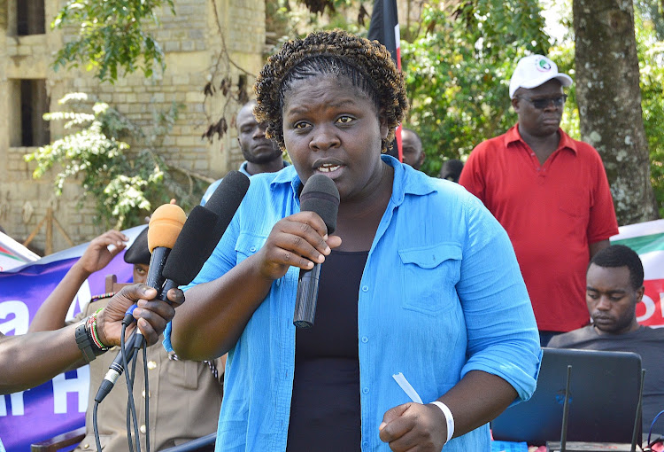 Getry Agiza from the Friends United Meeting organization speaking after the National Women's peace walk procession in Kakamega on Saturday