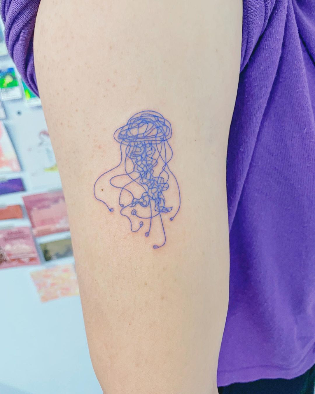 Blue Small Jellyfish Tattoo