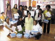 NWE LIFE: Ikhaya Lethemba grasuates in nail technology show off thier certificates and start-up packs during the gradution ceremony at the shelter in Braamfontein. Pic. Penwell Dlamini. 25/09/2008. © Sowetan.