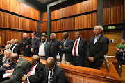 The accused In the Transnet fraud and corruption case in the dock on November 30 2022 in the Palm Ridge magistrate's court, south of Johannesburg. They include Anoj Singh (right) and Brian Molefe (second from right).