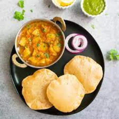 Aloo Tamatar Rassewali + Poori (5 Pcs)