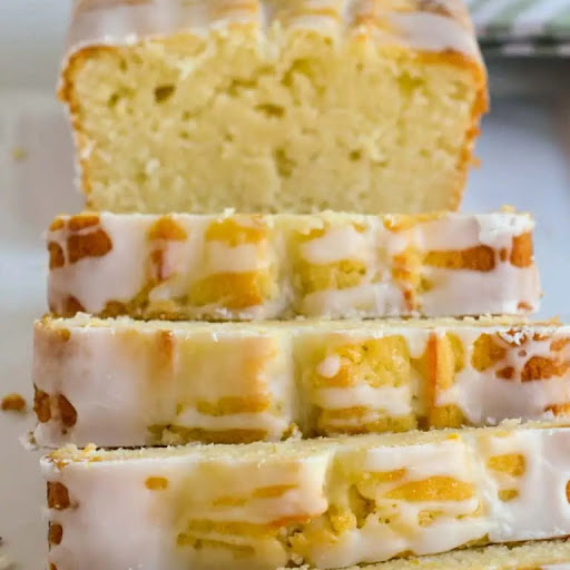 A quick and easy tasty Lemon Pound Cake made with fresh lemons and lemon zest and topped with a tangy two-ingredient lemon glaze.