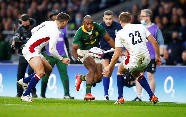 Makazole Mapimpi of SA swoops in during the 2021 Castle Lager Outgoing Tour match against England at Twickenham Stadium in London on Saturday.