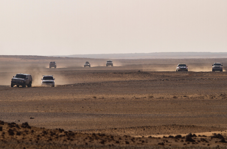 Various cars during Stage 3 of the Dakar Rally 2022 between Al Artawiya and Al Qaysumah on January 4 in Al Qaysumah, Saudi Arabia.