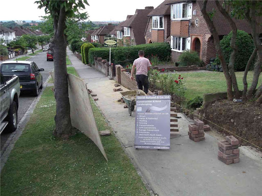 Garden walls, gates and fences, back of house painted and new patio laid - London