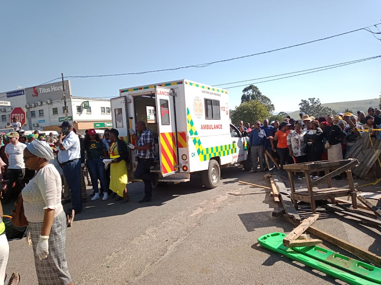 Rescue workers on the scene after four people died when a shop wall collapsed in Ngcobo.