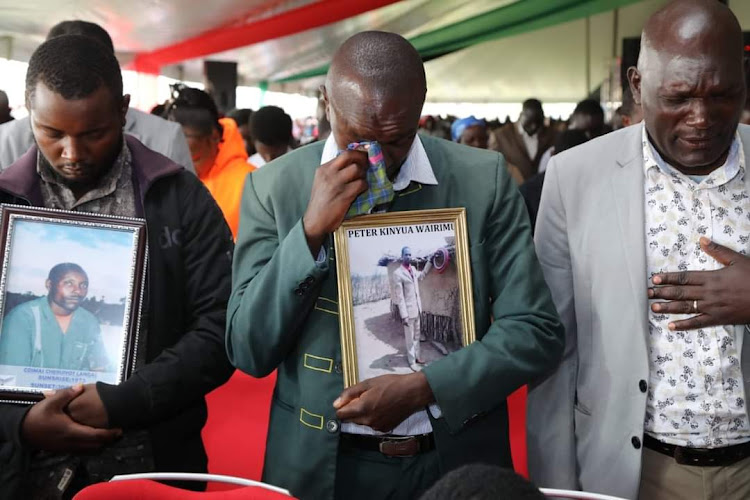Relatives of the Londiani crash victims mourn their loved ones during a memorial service in Kericho on July 4,2023.