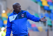 Chippa United head coach Dan Malesela reacts on the touchline during a Absa Premiership match against Bloemfontein Celtic at Dr Molemela Stadium in Bloemfontein on August 5 2018.