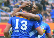 Ruhan Nel of the Stormers celebrates scoring a try with Damian Willemse in their Super Rugby match against the Jaguares at Newlands on Saturday, February 22.