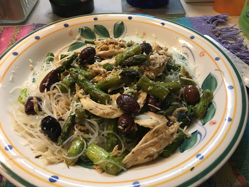 Chicken & Asparagus Sauce on a bed of rice with kalamata olives. 