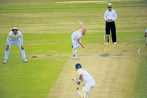 IN FULL SWING: Warriors fast bowler Andrew Birch steams in to bowl during the fourth day of their Sunfoil Series match against the Cobras at Buffalo Park yesterday Picture: SINO MAJANGAZA