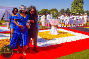 Siya Sesimani's mother Thando struggles at her son's tombstone unveiling. 