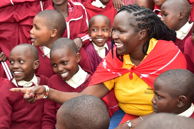 Dr Kakenya Ntaiya with her students at Kakenya Centre of Excellence in Enoosaen, Narok county