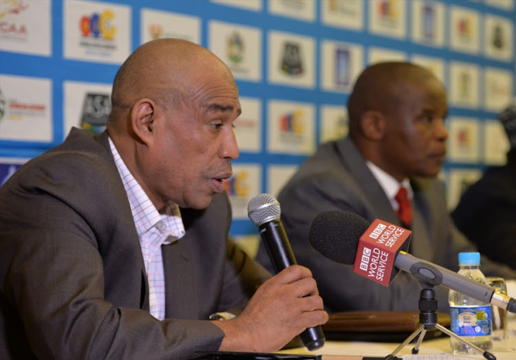 Athletics SA vice-president Dr Harold Adams (L) sits next to his president Aleck Skhosana during the pre CAA 20th African Senior Championships press conference at the Maharani Hotel on June 21, 2016 in Durban, South Africa.