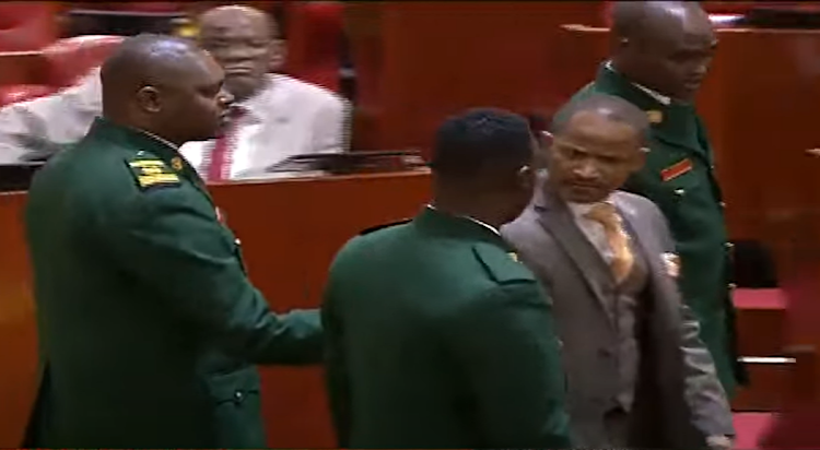 Sergents at arms escort Embakasi east MP Babu Owino out of the National Assembly on Thursday, August 10, 2023.