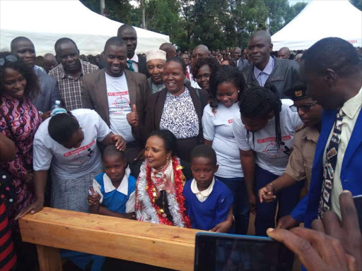 Education Cabinet Secretray Amina Mohamed at Kisuluni Primary School during the presentation of desks. /JOHN NALIANYA