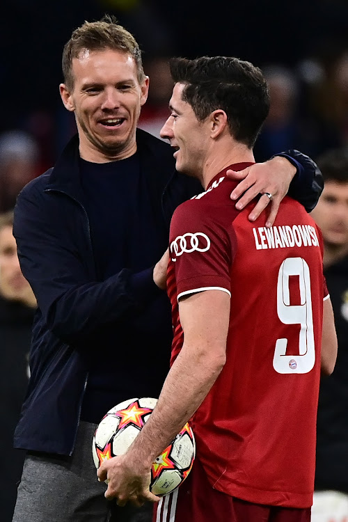 Bayern head coach Julian Nagelsmann (L) with Robert Lewandowski