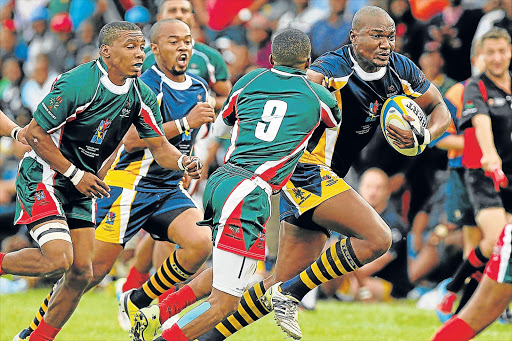 FIERY PLAY: EL Police player on his way to scoring the second try of the match against Gardens from Port Elizabeth during the Super 12 final held at Police Park over the weekend. Police will face an uphill battle when they take on Old Boys at the Old Selbornian Club tonight Picture: ALAN EASON