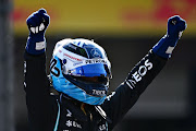 Pole position qualifier Valtteri Bottas celebrates in parc ferme during qualifying ahead of the F1 Grand Prix of Mexico at Autodromo Hermanos Rodriguez on November 06, 2021 in Mexico City, Mexico.