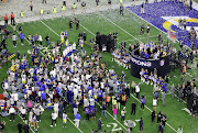 The Los Angeles Rams celebrate after beating the Cincinnati Bengals at SoFi Stadium in Inglewood, California on February 13, 2022 