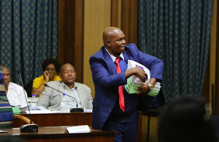 Former Nelson Mandela Bay mayor Mongameli Bobani leaves the council chamber after he was removed through a motion of no confidence