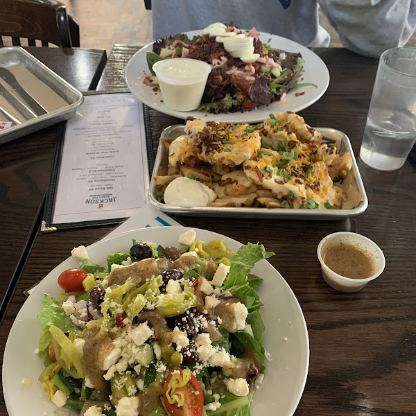 Greek and chef salads and loaded waffle fried