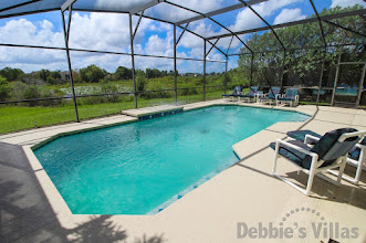 South-facing pool with lake view at this West Haven villa