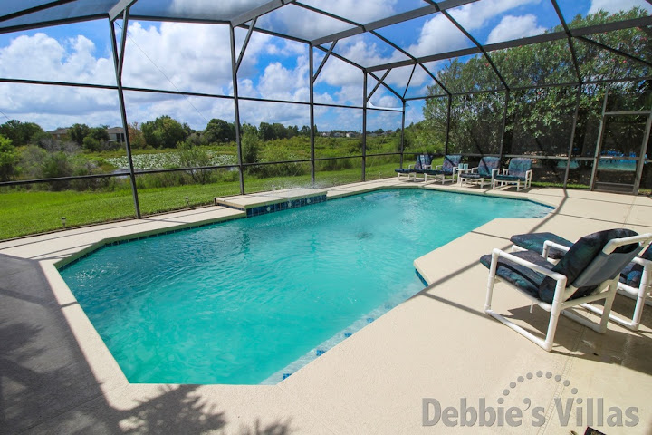 South-facing pool with lake view at this West Haven villa