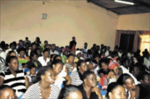 SPIRITUAL UPLIFTMENT: The congregation of The Temple of Grace in Krugersdorp listens attentively as a pastor preaches the Word of God. 24/03/09. © Sowetan.