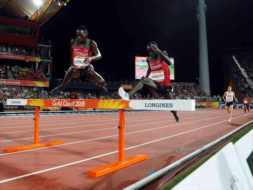 Conseslus Kipruto and Abraham Kibiwott of Kenya during the Men's 3000m Steeplechase of the Gold Coast 2018 Commonwealth Games at Carrara Stadium in Gold Coast, Australia, April 13, 2018. /REUTERS