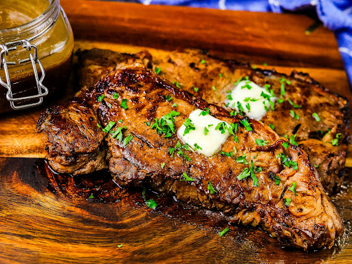 Lucy's Steak Marinade on a New York strip steak.