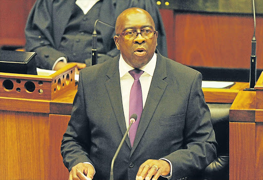 FIRM: Minister of Finance Nhlanhla Nene insists the government must cut unnecessary spending in order to deal with the problem of state indebtedness and lower than expected tax revenue Picture: GALLO IMAGES