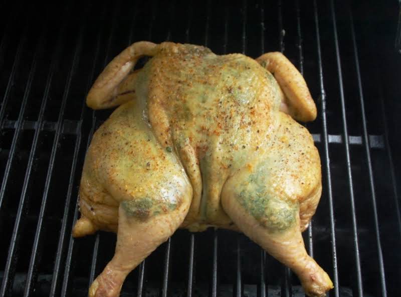 Grilled Goat Cheese And Spinach Stuffed Spatchcock Chicken As Set On Prepared Medium Heat Grill.