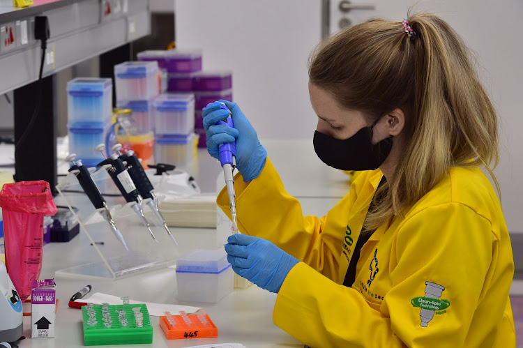 A technician at the Chan Soon-Shiong Centre for Epidemic Response and Innovation at Stellenbosch University on January 19 2022.