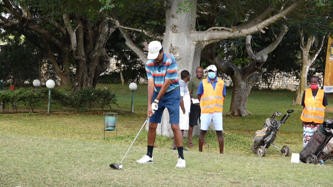 A golfer begins playing in the tournament at Malindi Golf and country club