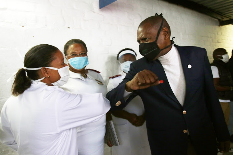 Health minister Zweli Mkhize greets Cecilia Makiwane Hospital staff.