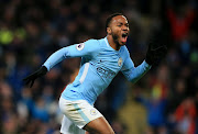 England and Manchester City forward Raheem Sterling celebrates after scoring the winning goal in a 2-1 win over Huddersfield Town at the Etihad Stadium in Manchester on Wednesday 29 November 2017. 