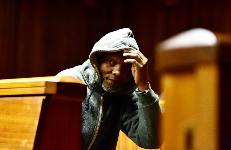 Mzingisi James Ntshontshi, 50, who had attempted to cover his face during his rape trial, was sentenced to life in prison in the Port Elizabeth high court on Wednesday.